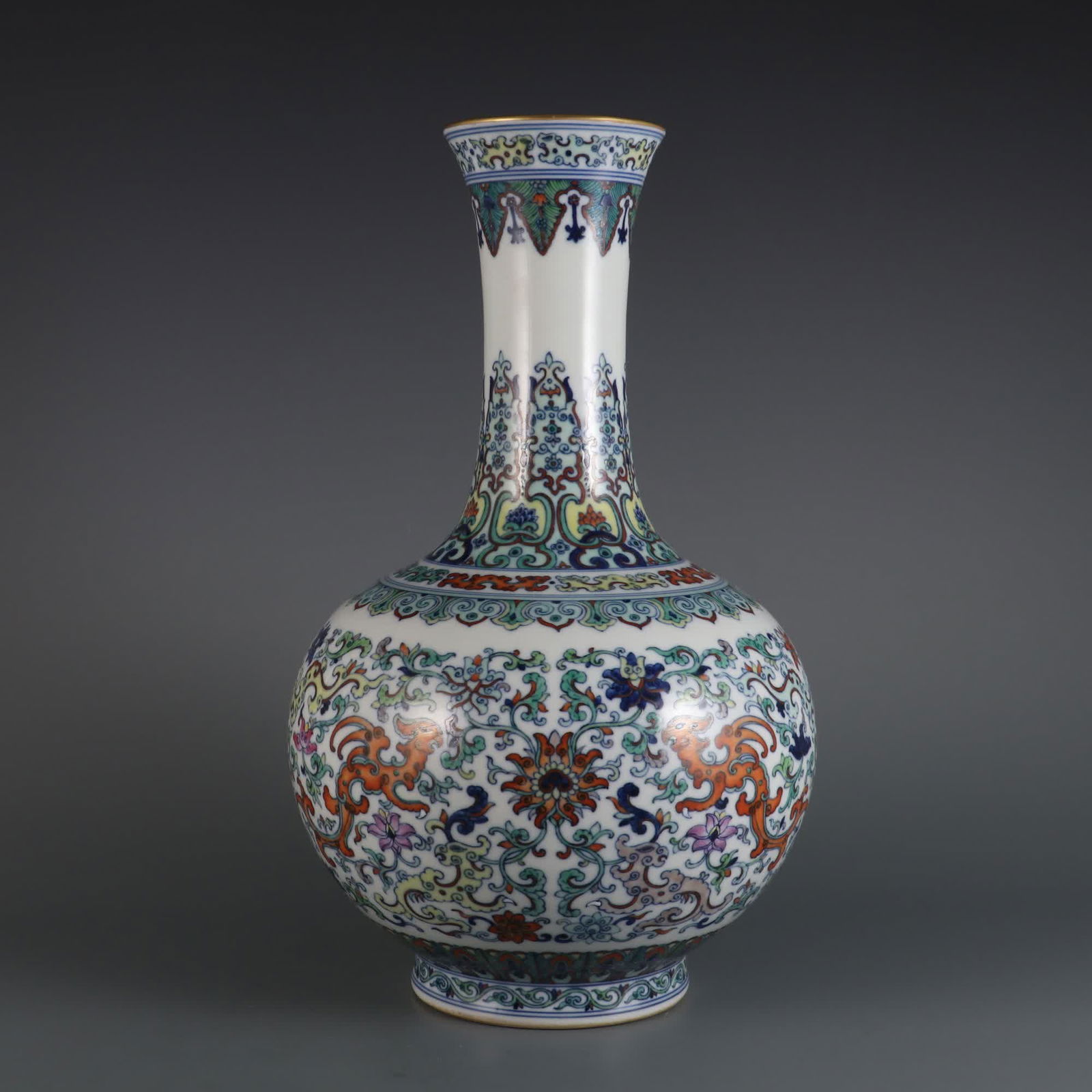 A Qing Dynasty Qianlong year Doucai entwined lotus Kui Feng pattern appreciation vase (1 of 9)