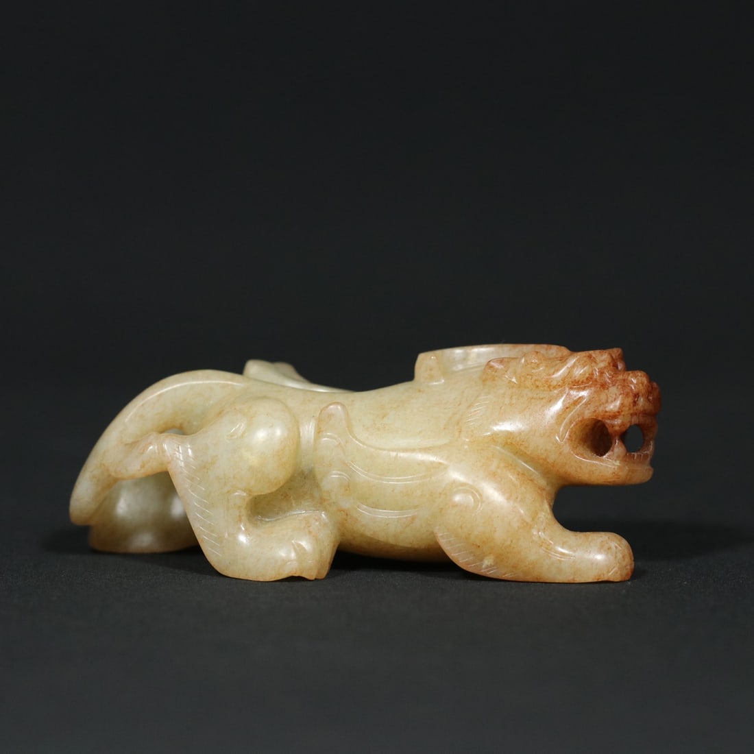 An Exquisite White Jade Auspicious Beast Ornament (1 of 9)