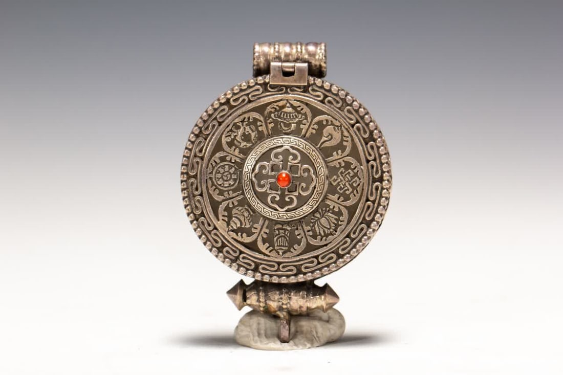 A Qing Dynasty Tibetan silver gawu box (1 of 7)