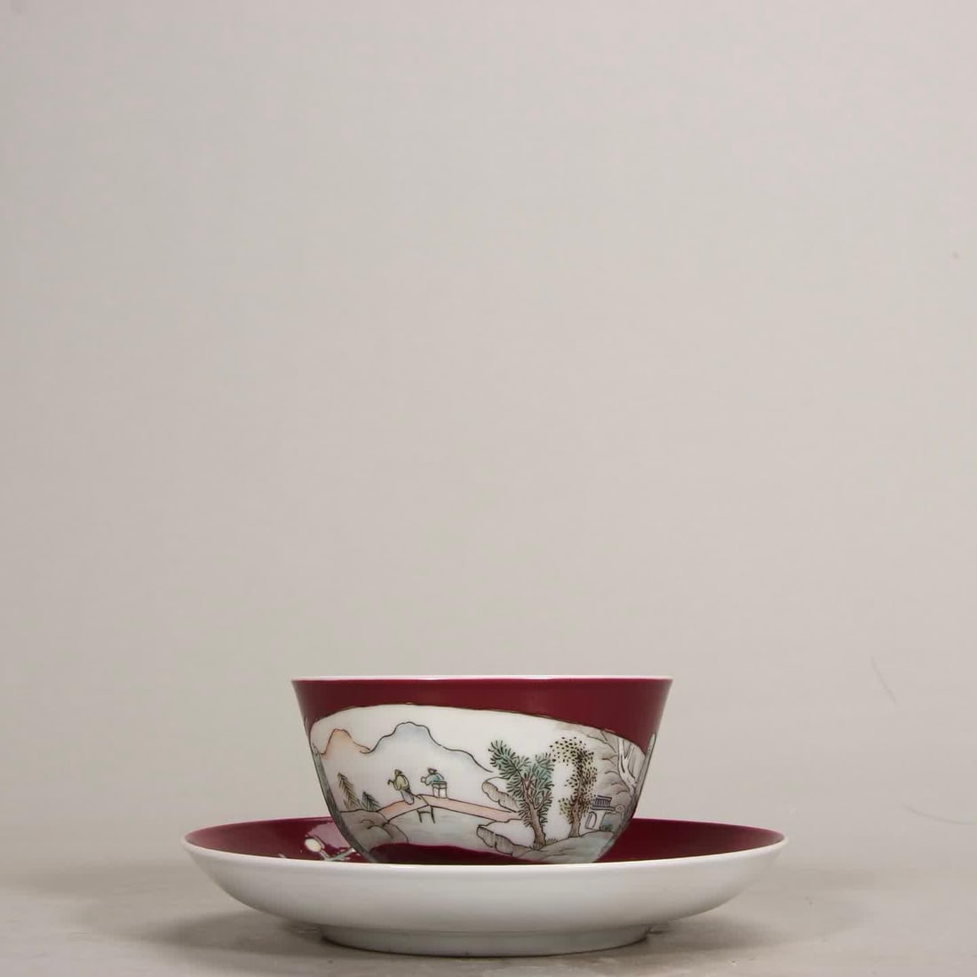 A cup and saucer of the Qing Dynasty Yongzheng carmine red window opening figure: Qing Dynasty Yongzheng carmine red window opening figure cup and saucer SIZE: Cup H: 4.8cm MouthD: 8.4cm Saucer H: 2.3cm D: 13.2cm