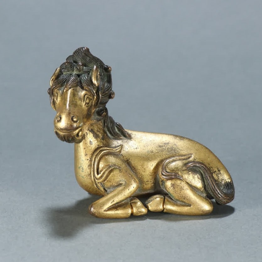 A Qing Dynasty copper gilt auspicious beast town ruler: Qing Dynasty copper gilt auspicious beast town ruler SIZE: H:5.3cm W:6.5cm W:253.4g (The Dimensions Of All Batches Are Manually Measured.If You Need More Detailed Information, Please Contact Our Custo