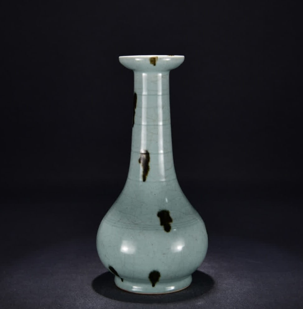 A Song Longquan kiln powder celadon pointillism long-necked bottle: Song Longquan kiln powder celadon pointillism longneck bottle SIZE: H:39cm W:20cm (The Dimensions Of All Batches Are Manually Measured.If You Need More Detailed Information, Please Contact Our Custome