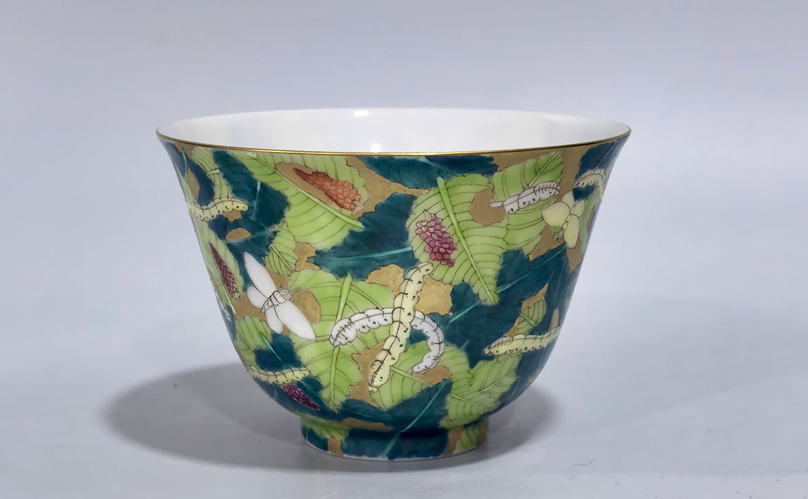A Qing Yongzheng enamel colored gold ground mulberry leaf silkworm butterfly pattern cup: Qing Yongzheng enamel colorful gold ground mulberry leaf silkworm butterfly pattern cup SIZE: H:6cm MouthD:9cm (The Dimensions Of All Batches Are Manually Measured.If You Need More Detailed Informatio