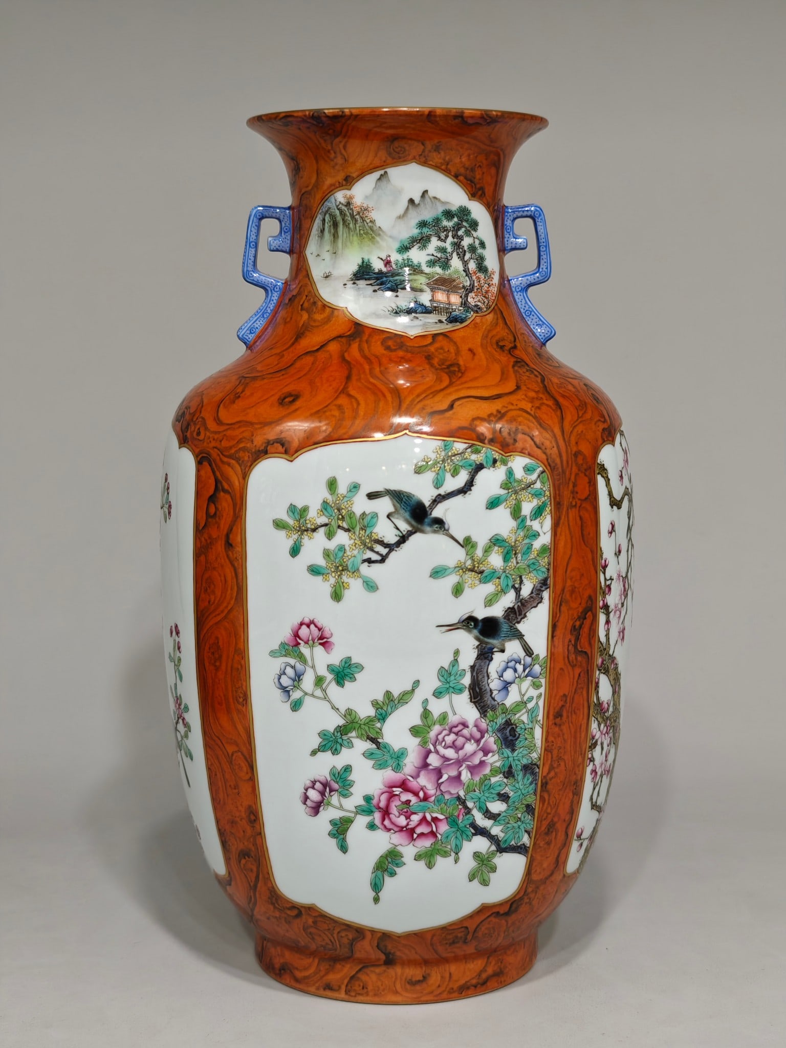 An Exquisite Famille-Rose Imitation Stone Grain Glaze Flower and Bird Pattern Landscape Pattern: An Exquisite Famille-Rose Imitation Stone Grain Glaze Flower and Bird Pattern Landscape Pattern Double-Ears Vase Qing Dynasty, China Qianlong Six-character Mark Size:31.5cmx18cm (The Dimensions Of All
