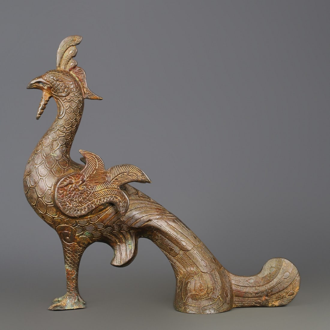 An Exquisite Bronze Phoenix Ornament: An Exquisite Bronze Phoenix Ornament W.Zhou , China Size:42cmx34cm Weight:2100g (The Dimensions Of All Batches Are Manually Measured.If You Need More Detailed Information, Please Contact Our Customer