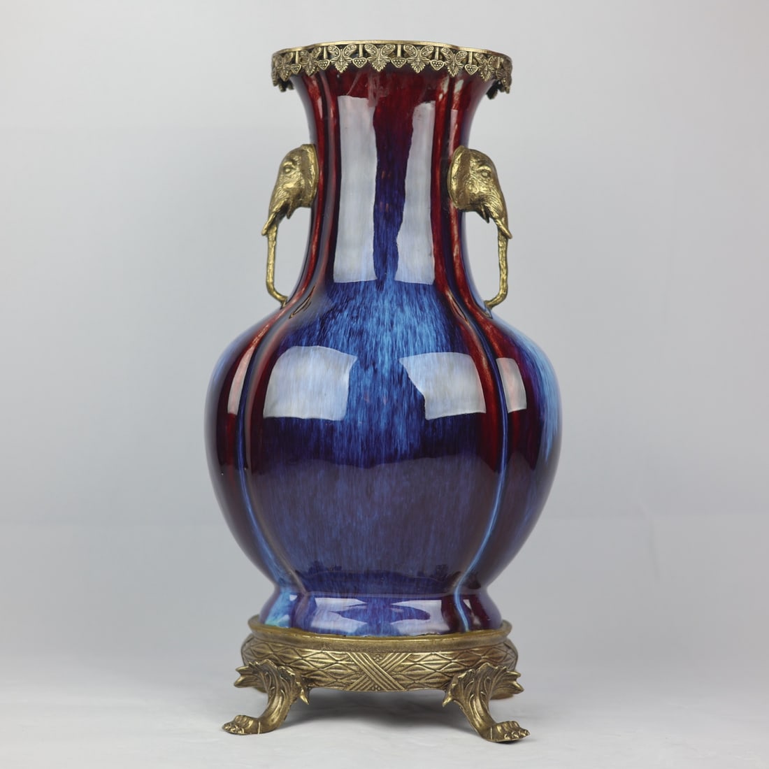 An Exquisite Flambe Glazed Inlaid Bronze Double-Ears Vase: An Exquisite Flambe Glazed Inlaid Bronze Double-Ears Vase Qing Dynasty, China Yongzheng Six-character Mark Size:46cmx23cm (The Dimensions Of All Batches Are Manually Measured.If You Need More Detailed