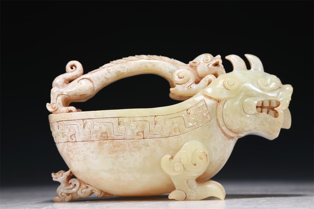 A Marvelous White Jade 'Auspicious Beast' Ewer (1 of 8)