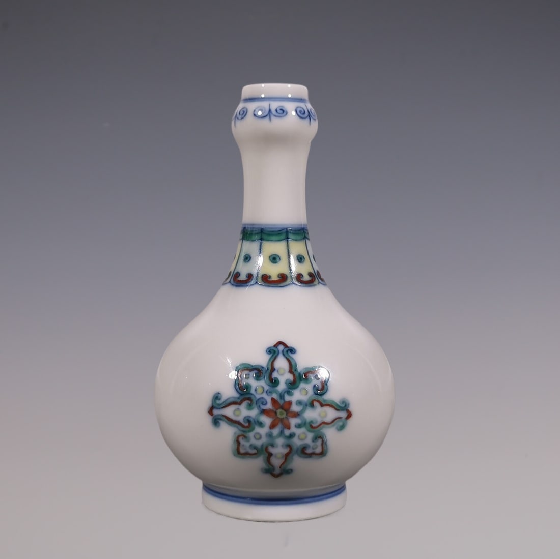 An Exquisite Doucai Blue and White Flower Pattern Vase (1 of 6)