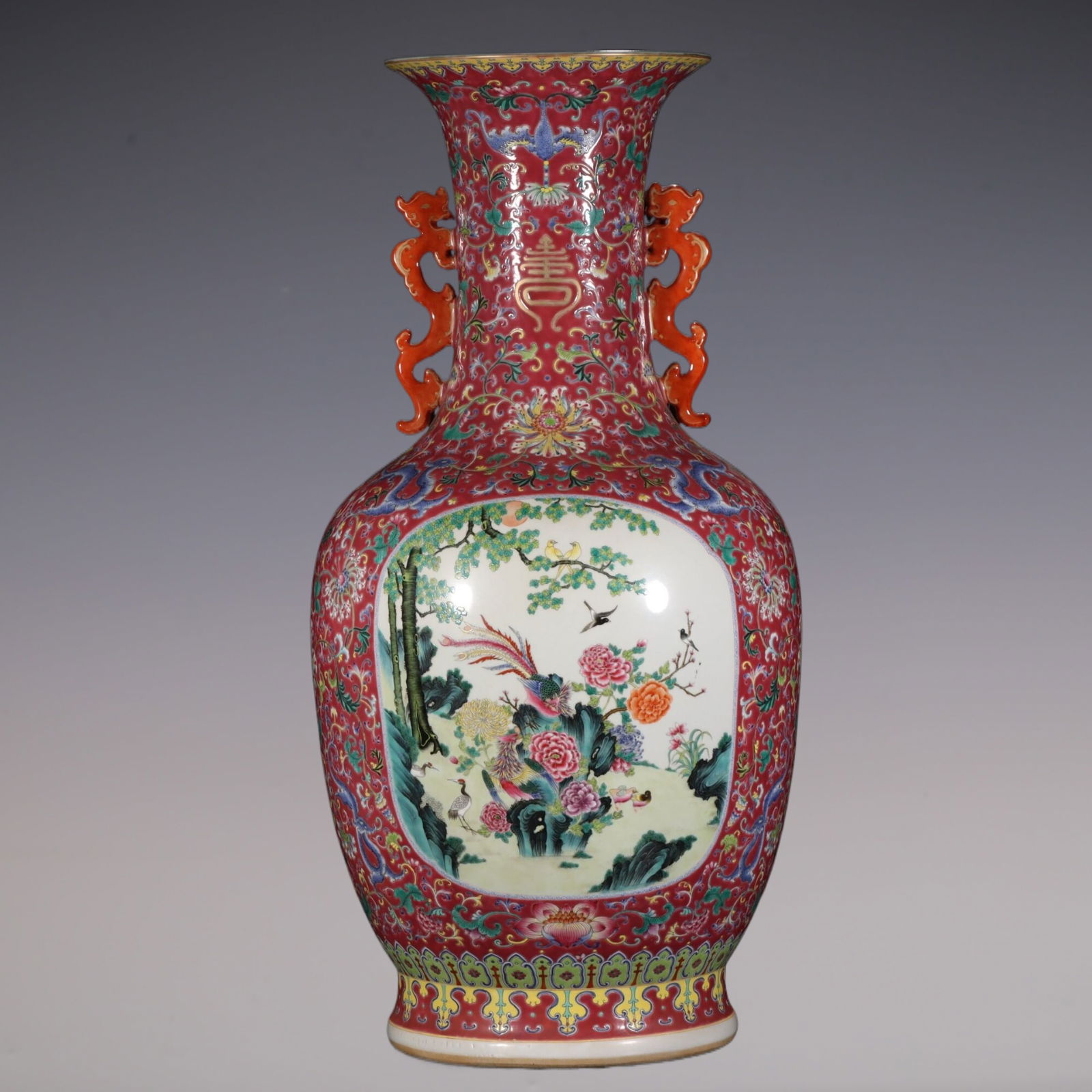 An Exquisite Famille-Rose Ruby Red-Glazed Bats and Peach Pattern Lotus Pattern Flower and Bird: An Exquisite Famille-Rose Ruby Red-Glazed Bats and Peach Pattern Lotus Pattern Flower and Bird Pattern Double-Ears Vase Qing Dynasty, China Qianlong Six-character Mark Size:79.8cmx28cm (The Dimensions