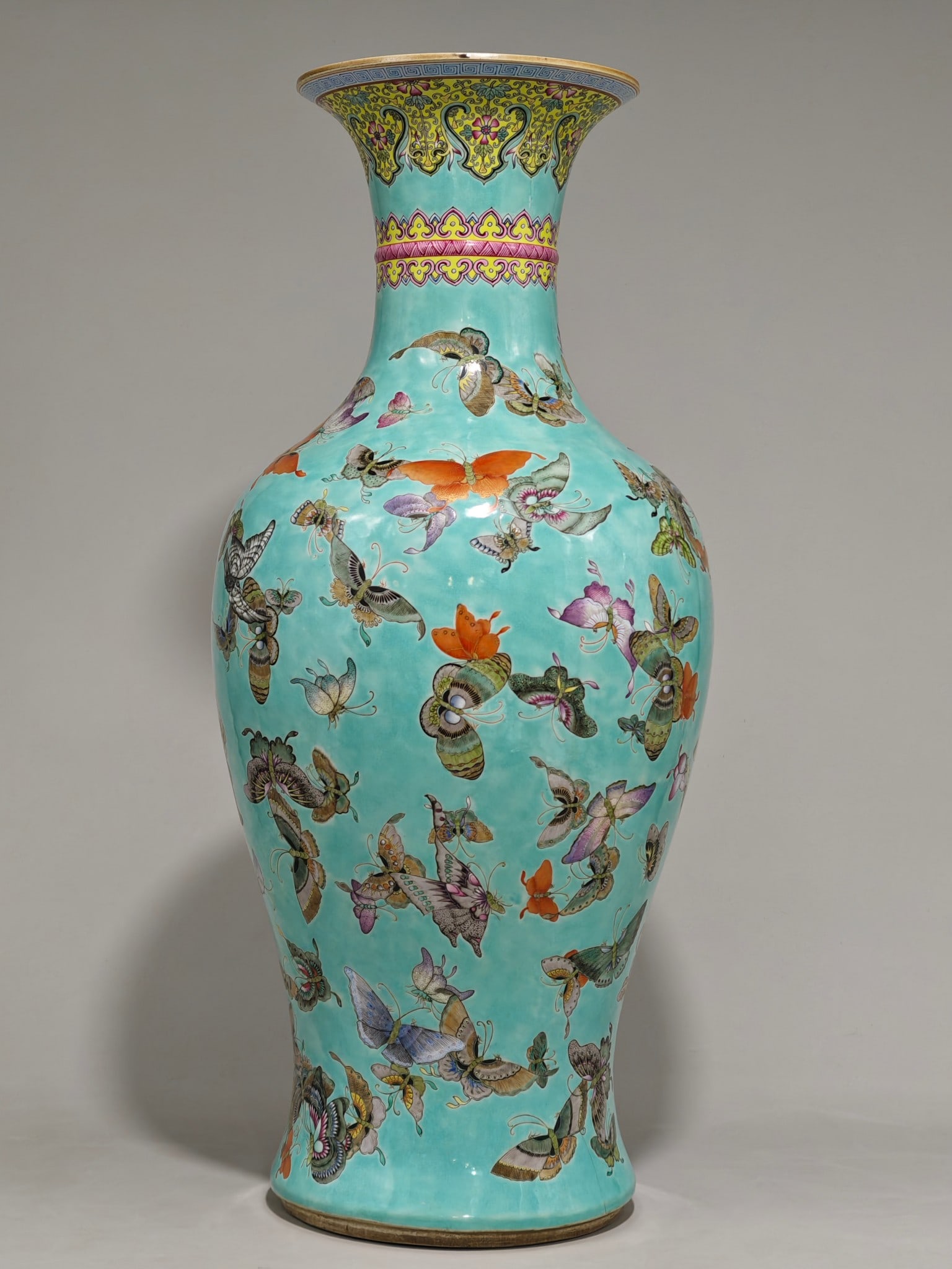 An Exquisite Famille-Rose Green Ground Flower and Butterfly Pattern Vase (1 of 9)