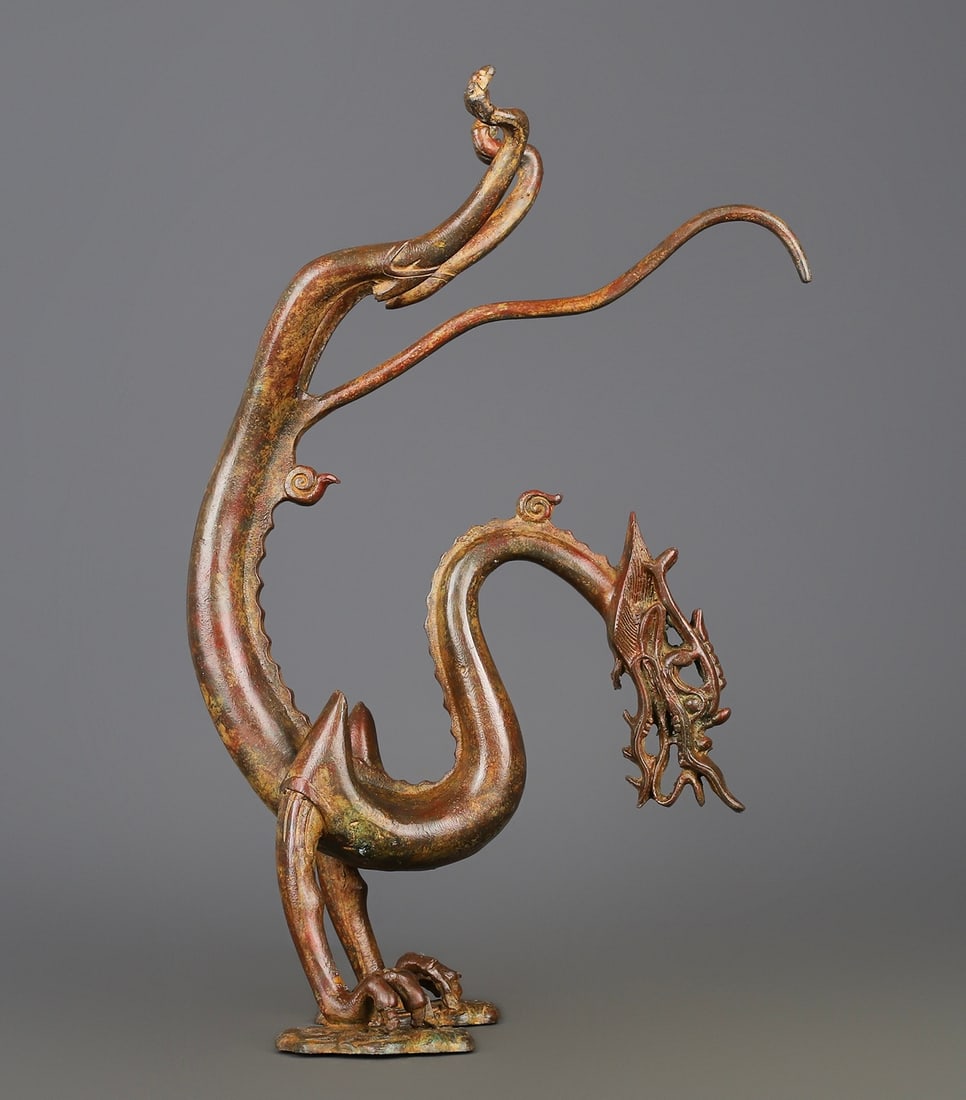 An Exquisite Bronze Dragon Ornament: An Exquisite Bronze Dragon Ornament Han Dynasty, China Size:24cmx36cm Weight:2000g (The Dimensions Of All Batches Are Manually Measured.If You Need More Detailed Information, Please Contact Our Custom