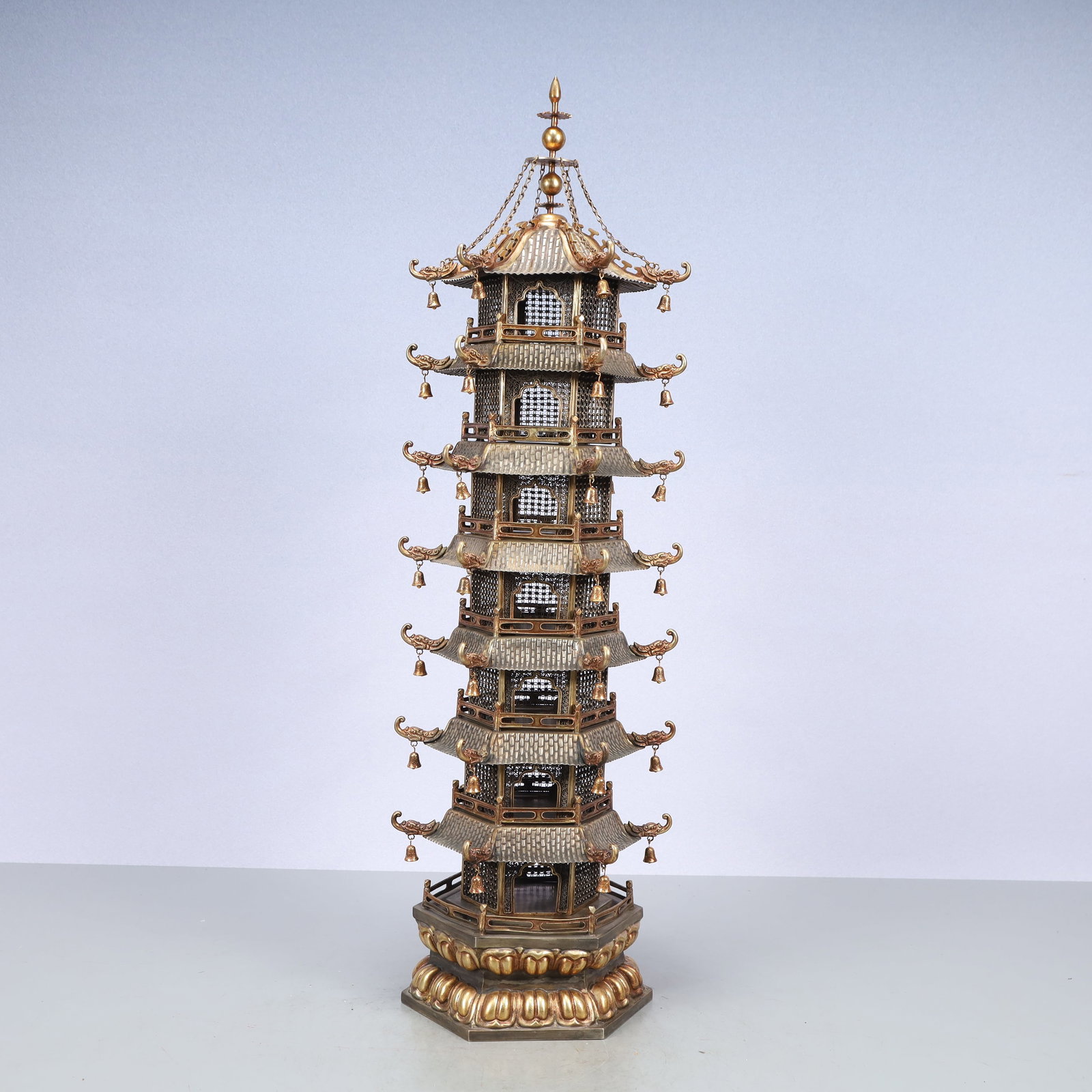 A Exquisite Gilt Silver Pagoda: A Exquisite Gilt Silver Pagoda Tang Dynasty, China Zhenguan Four-character Mark Size:13.5cmx61cm Weight:3150g (The Dimensions Of All Batches Are Manually Measured.If You Need More Detailed Information
