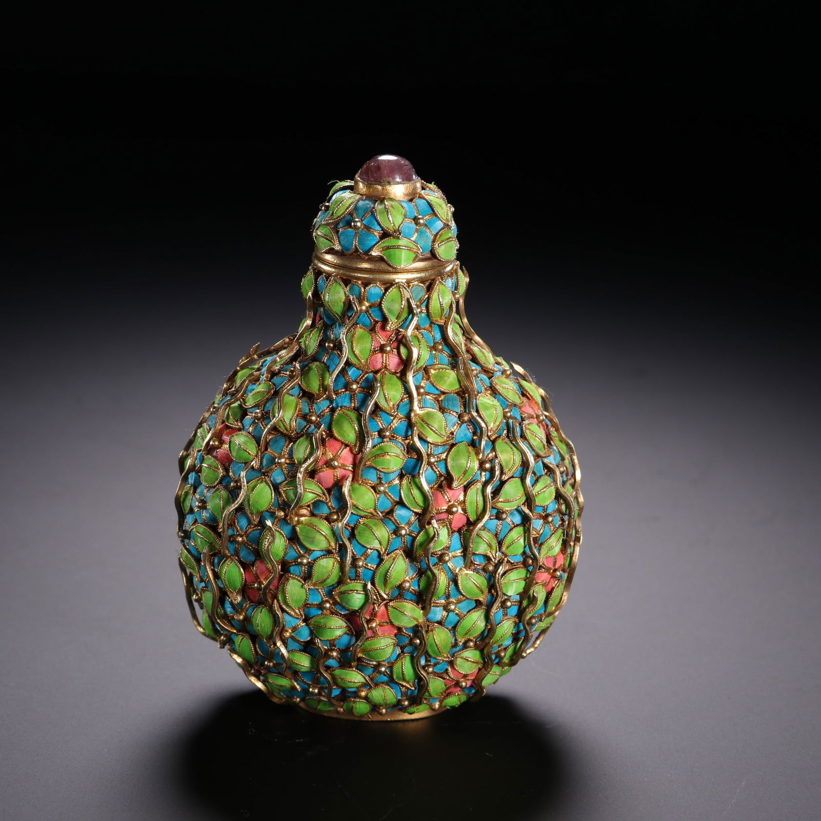 A silver gilt enamel colored snuff bottle from the Qing Dynasty (1 of 9)