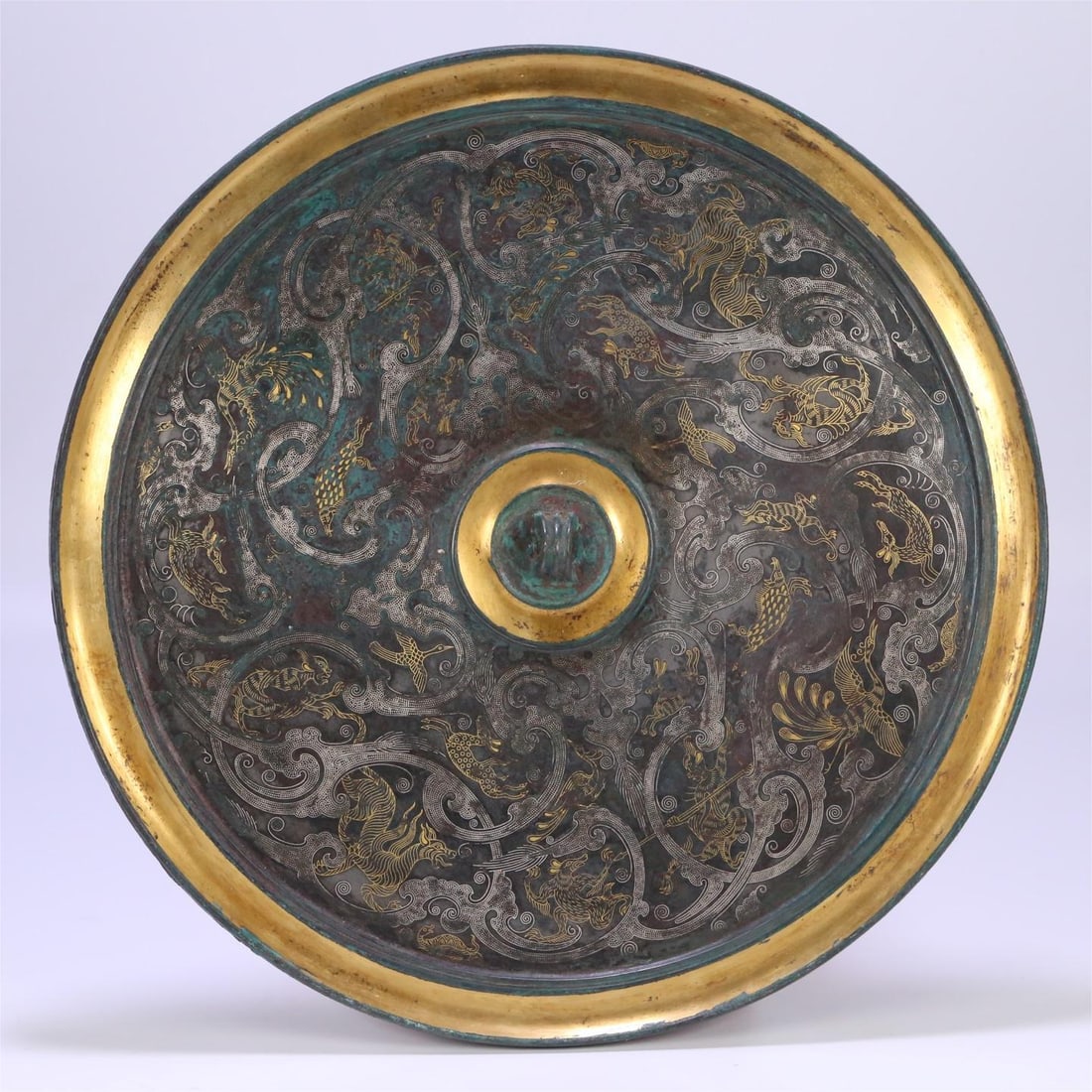 A bronze mirror with a bronze pattern of gold and silver beast and bird pattern from the Han Dynasty: Han Dynasty bronze mirror with wrong gold and silver beast and bird pattern Size:29x0.7cm W:1715g (The Dimensions Of All Batches Are Manually Measured.If You Need More Detailed Information,Please Cont