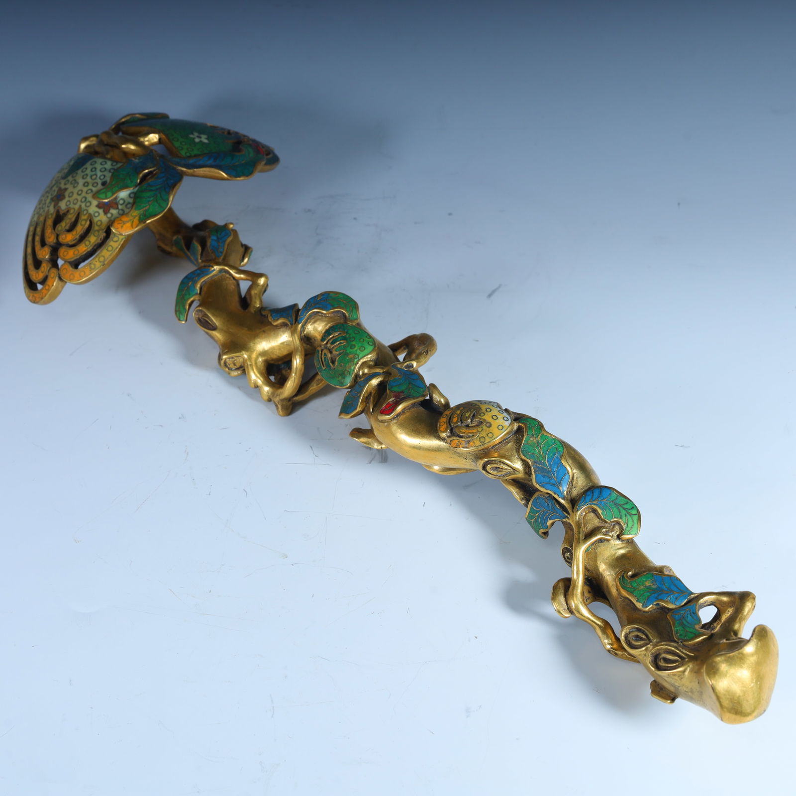 A Qianlong cloisonné gilt ruyi from the Qing Dynasty: Qianlong cloisonné gilt ruyi of the Qing Dynasty Length 48cm,width 16.6cm,height 8cm,weight 3.1kg (The Dimensions Of All Batches Are Manually Measured.If You Need More Detailed Information,Please Con