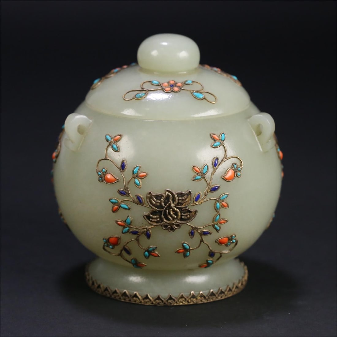 A Qing Dynasty Hendus Hetian jade inlaid silver gilt multi-treasure floral pattern three-eared jar: Qing Dynasty Hendustan Hetian jade-inlaid silver-gilt multi-treasure floral pattern three-eared jar Size:10.5x9.5cm W:310.3g (The Dimensions Of All Batches Are Manually Measured.If You Need More Detai