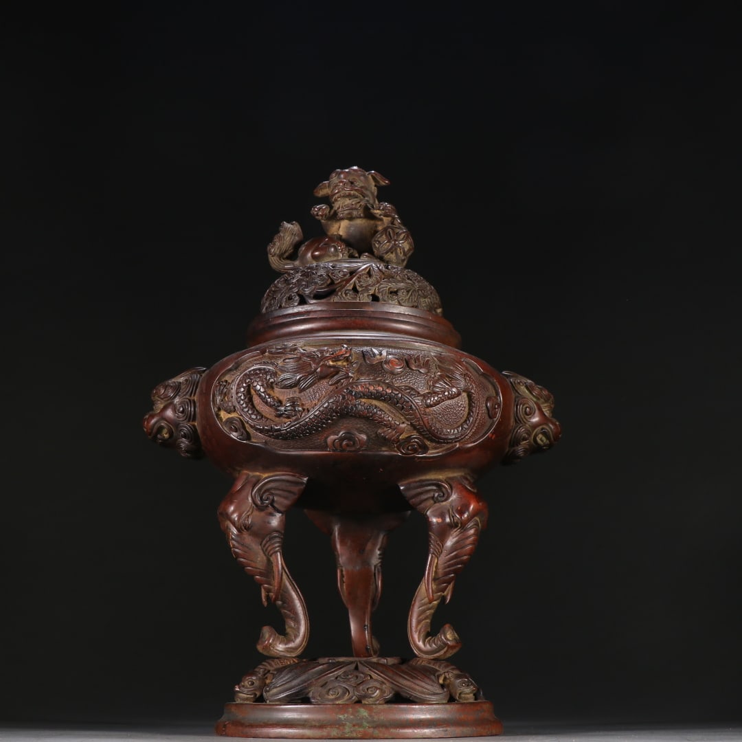 A copper dragon pattern three-legged aroma burner from the Qing Dynasty: Qing Dynasty copper tire dragon pattern three-legged aroma burner Size:H:30cm W:20cm W:3320.2g (The Dimensions Of All Batches Are Manually Measured.If You Need More Detailed Information,Please Contact