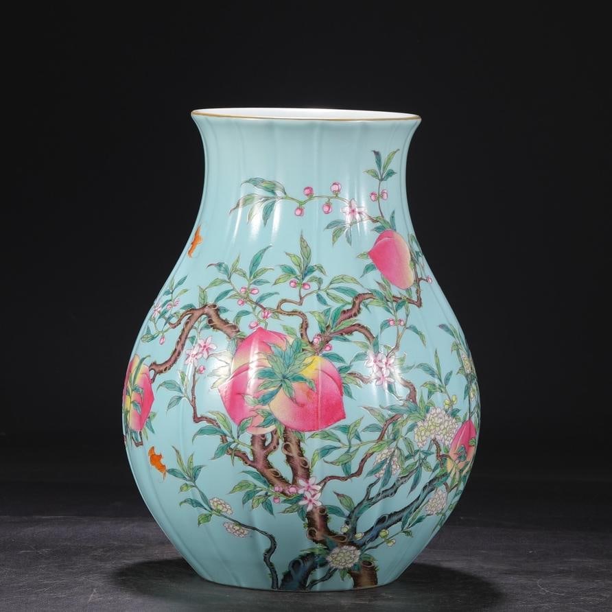 A large bottle of apple green pastel folded branches and peach pattern melon edges made in the: Qing Dynasty Yongzheng year apple green pastel folded branch longevity peach pattern melon edge large bottle Size:H:29.5cm Calibre:14cm Belly diameter:21cm (The Dimensions Of All Batches Are Manually