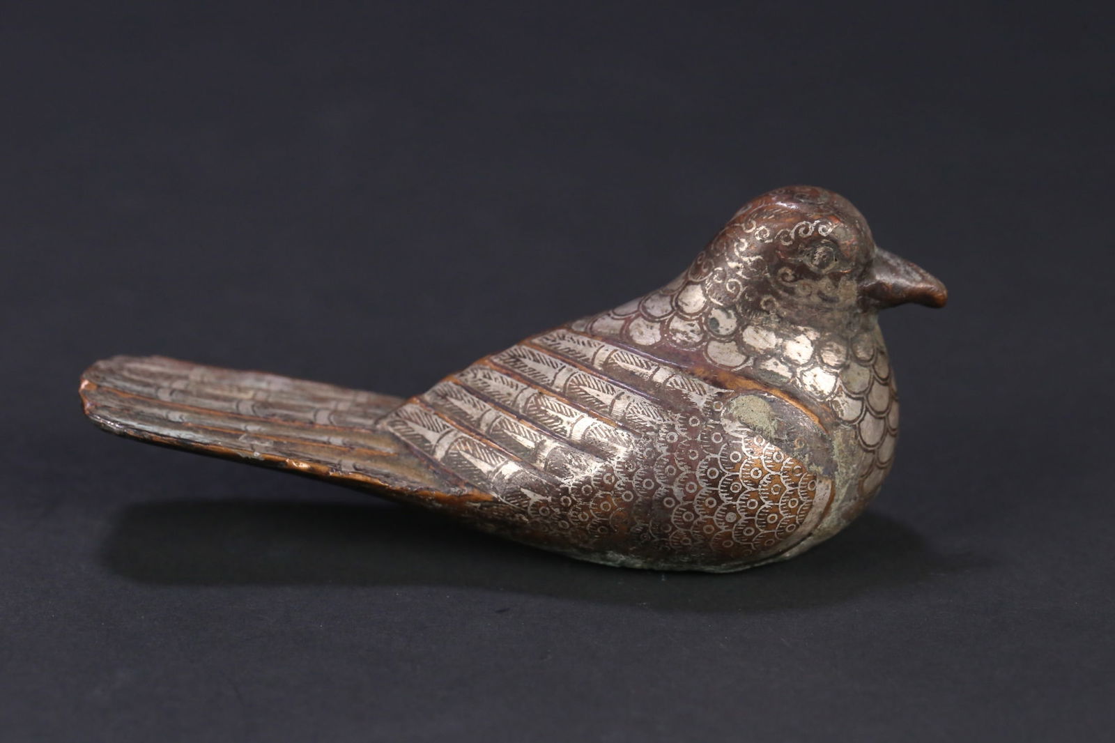 A wrong gold and silver bird ornament of the Han Dynasty (1 of 9)