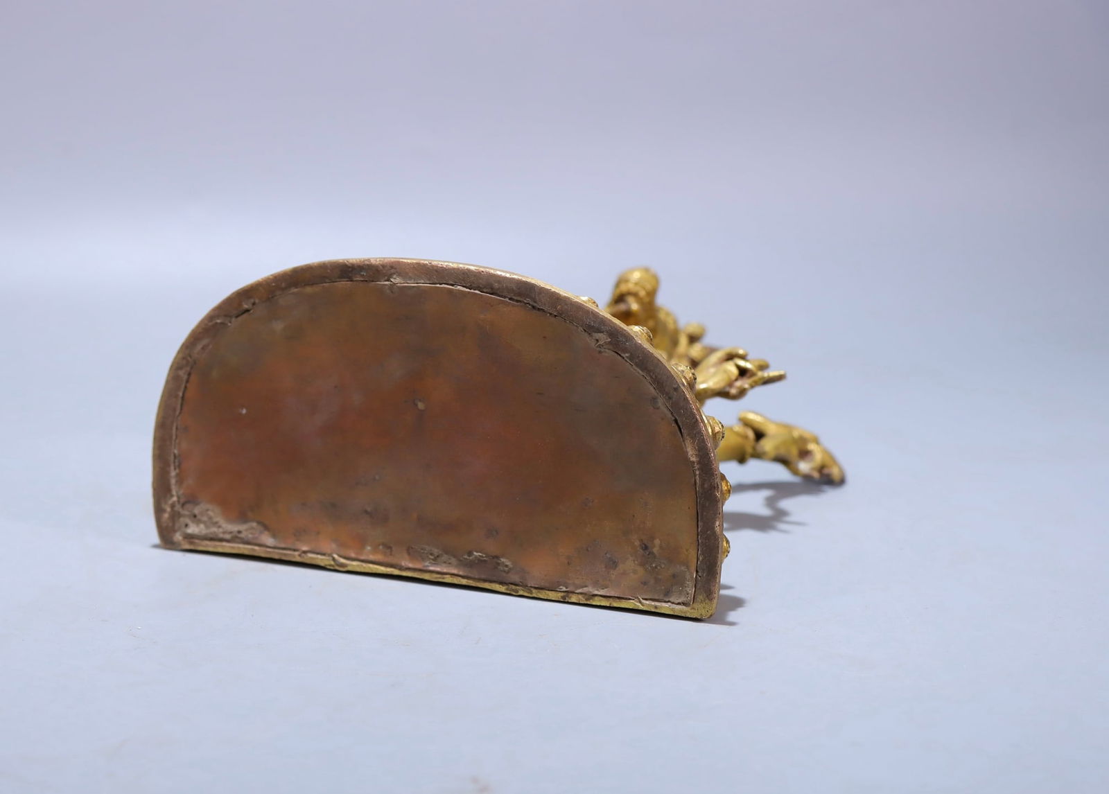 A fine old copper gilt protector - 9