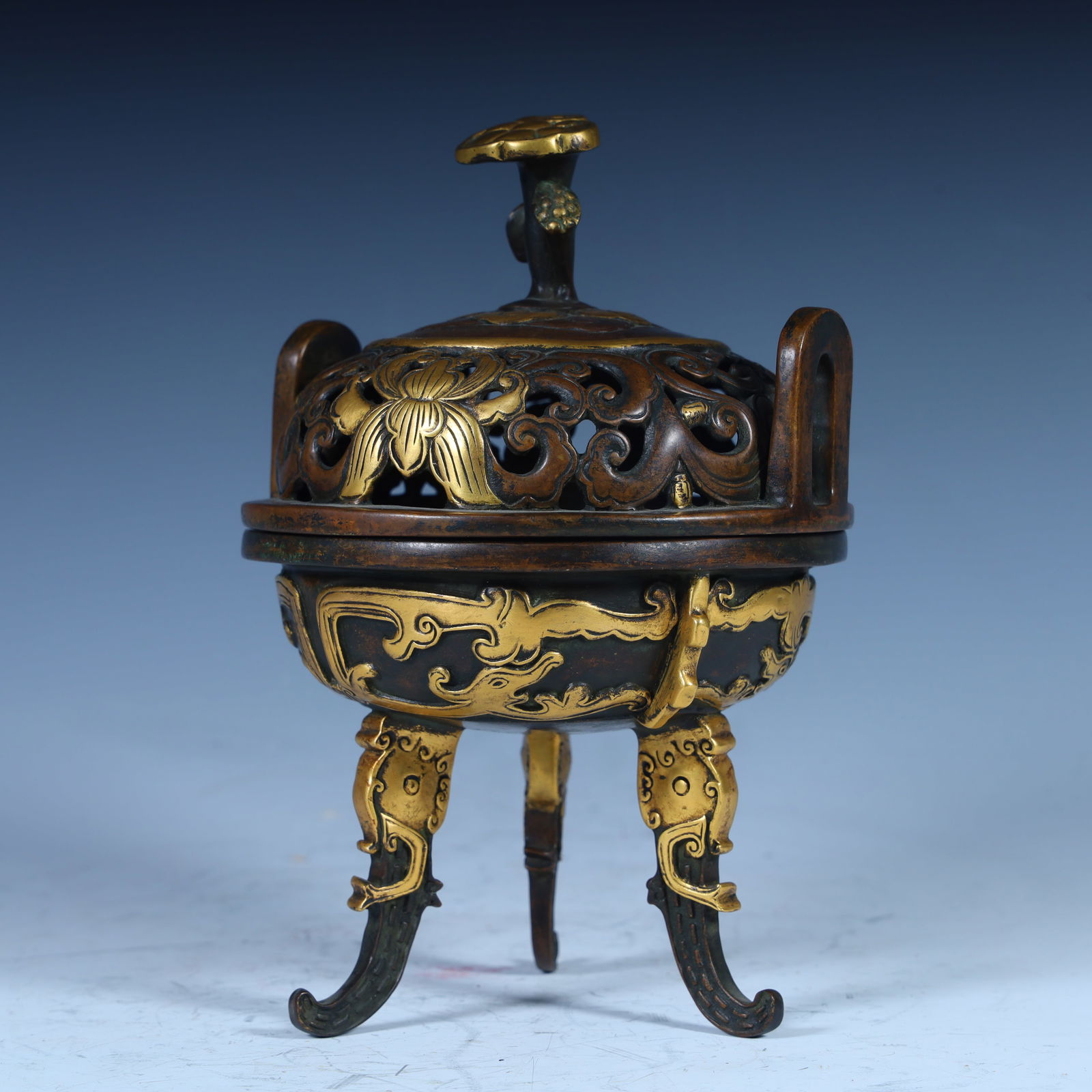 A copper-gilt three-legged incense burner from the Qing Dynasty (1 of 11)