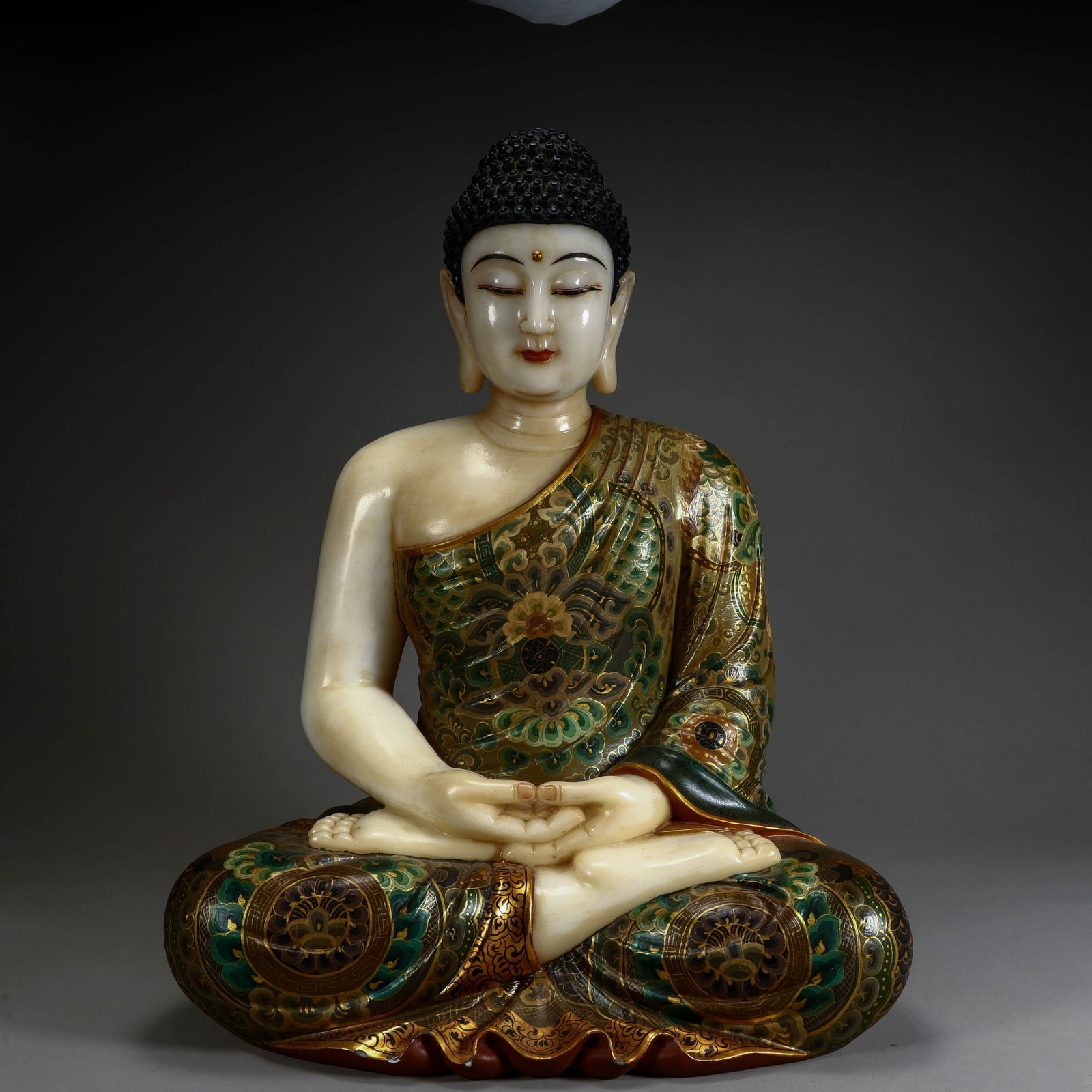 A white jade depiction of Shakyamuni Buddha statue from the Qing Dynasty (1 of 10)