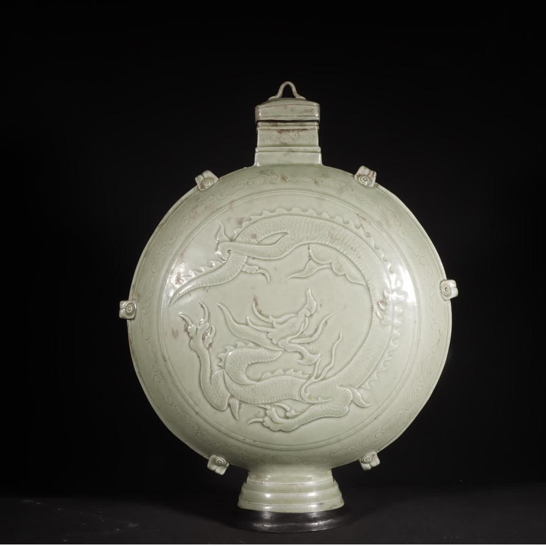 A five-generation Yue kiln secret color celadon relief dragon pattern wearing a flat pot: Five generations of Wuyue kiln secret color celadon relief dragon pattern with flat pot SIZE: H:35.5cm W:28cm (The Dimensions Of All Batches Are Manually Measured.If You Need More Detailed Information