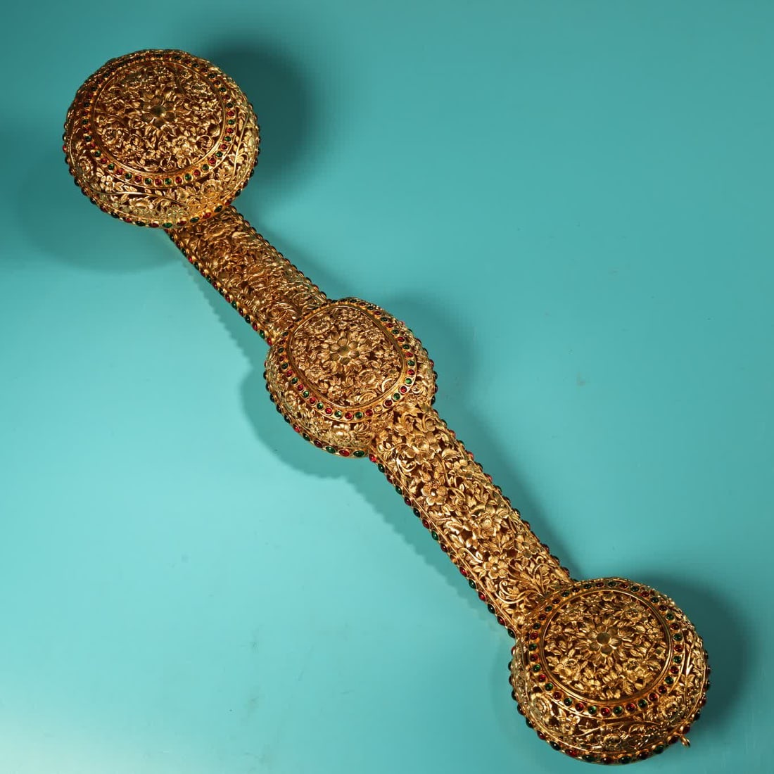 A Qing Dynasty high-relief engraving hollow gilt ruyi: Qing Dynasty high-relief engraving hollow gilt ruyi SIZE: W:900g L:48cm W:11cm (The Dimensions Of All Batches Are Manually Measured.If You Need More Detailed Information, Please Contact Our Customer S