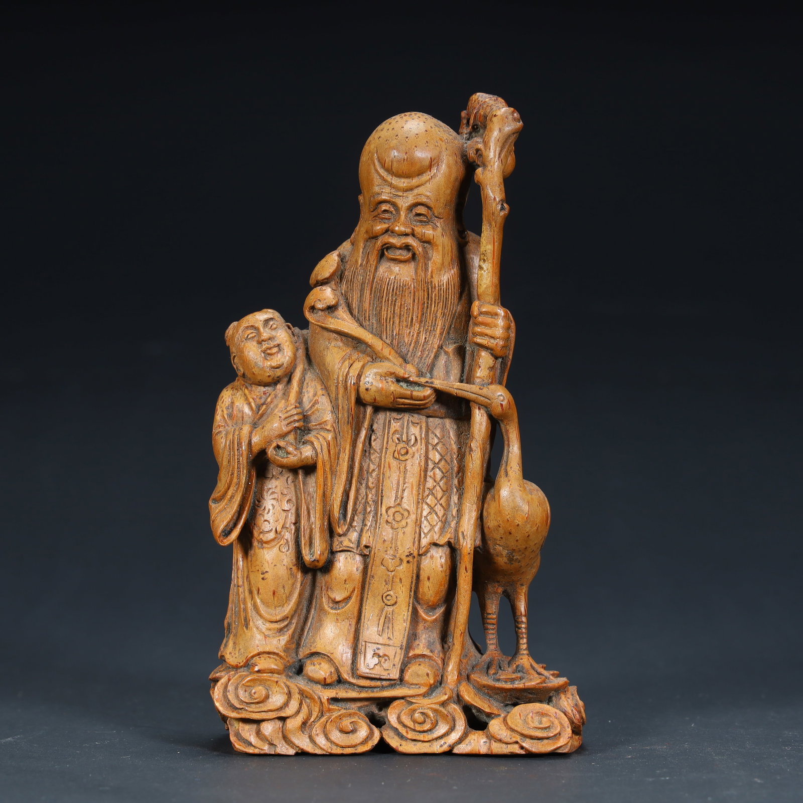 A Qing Dynasty bamboo carving birthday boy ornament: Qing Dynasty bamboo carving birthday boy ornament SIZE: H: 12.3cm L: 7cm W: 3.5cm W: 74.7g (The Dimensions Of All Batches Are Manually Measured.If You Need More Detailed Information, Please Contact Ou