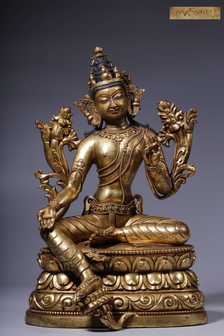 A seated statue of Tara, a bronze gilt green Tara, from the Qing Dynasty: Qing Dynasty copper gilt green Tara seated statue SIZE: H:36cm L:21cm W:18cm W:5.7kg (The Dimensions Of All Batches Are Manually Measured.If You Need More Detailed Information, Please Contact Our Cust
