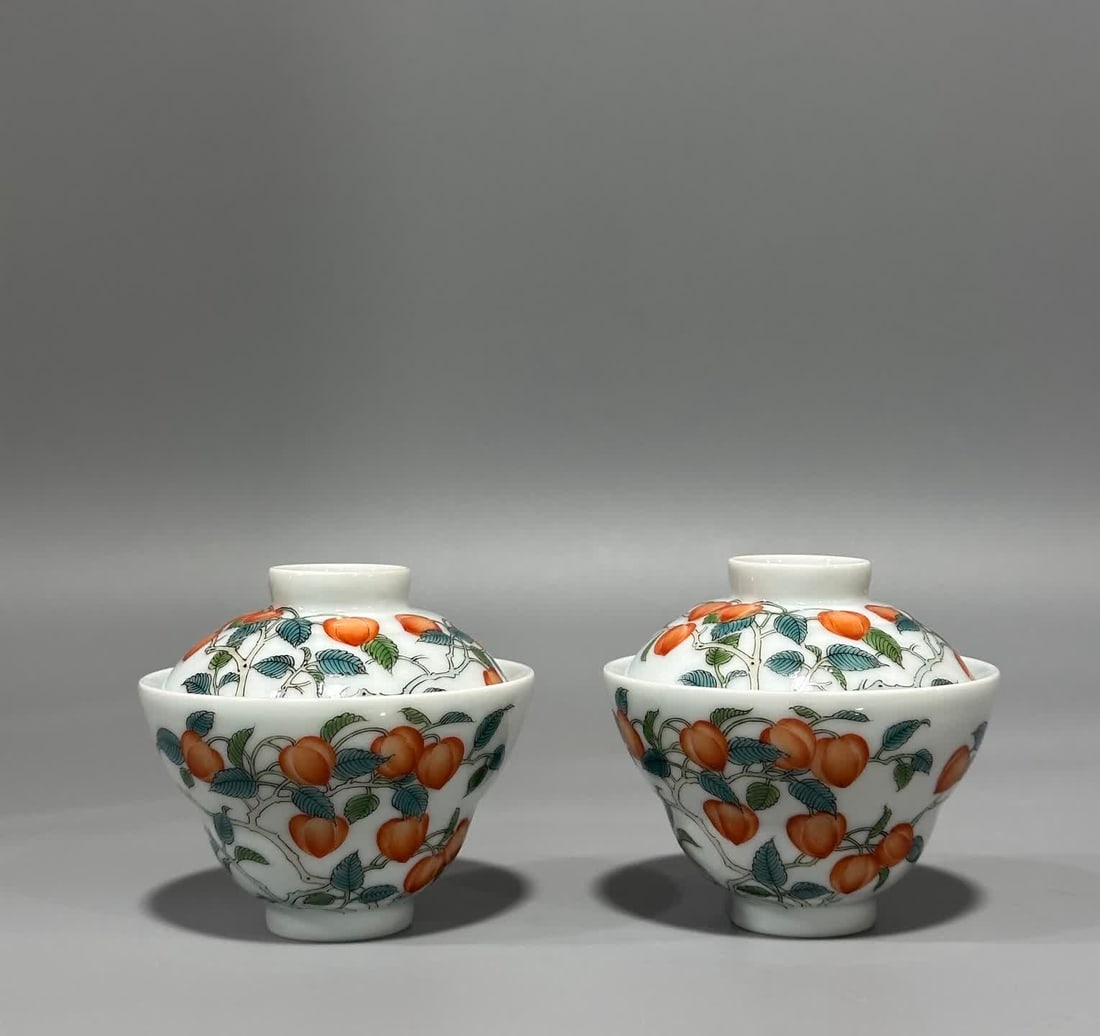 A pair of enamel cherry pattern bowls made in the Qianlong period of the Qing Dynasty: Qing Qianlong year enamel cherry pattern bowl SIZE: H: 6.5cm MouthD: 7.3cm Bottom diameter 2.7cm (The Dimensions Of All Batches Are Manually Measured.If You Need More Detailed Information, Please Cont