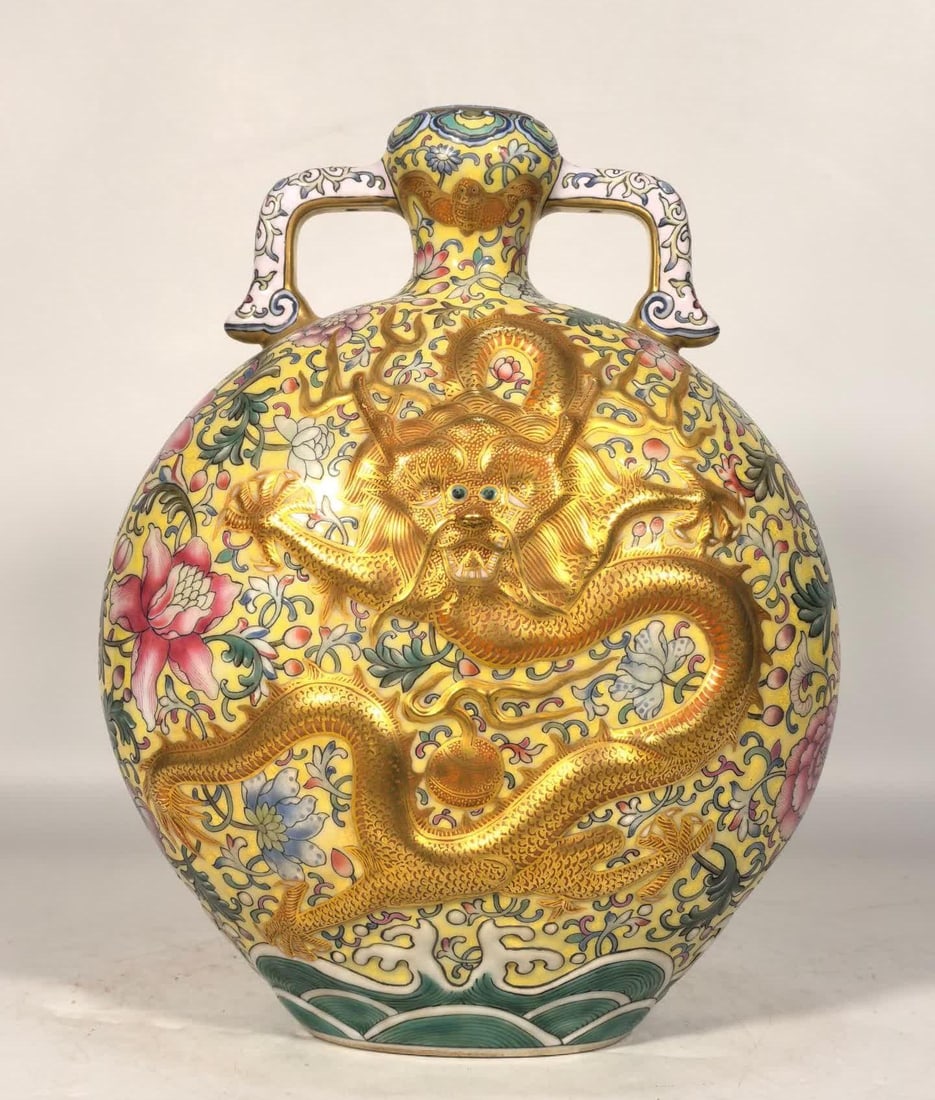 A Qing Qianlong enamel color emperor yellow entwined lotus carved gold-painted double dragon moon (1 of 9)