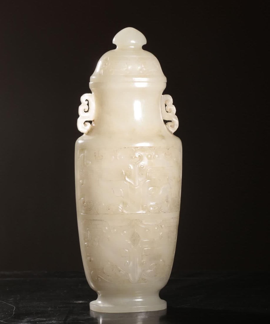 A Hetian white jade whole excavated carved animal face dragon pattern amphora (1 of 9)