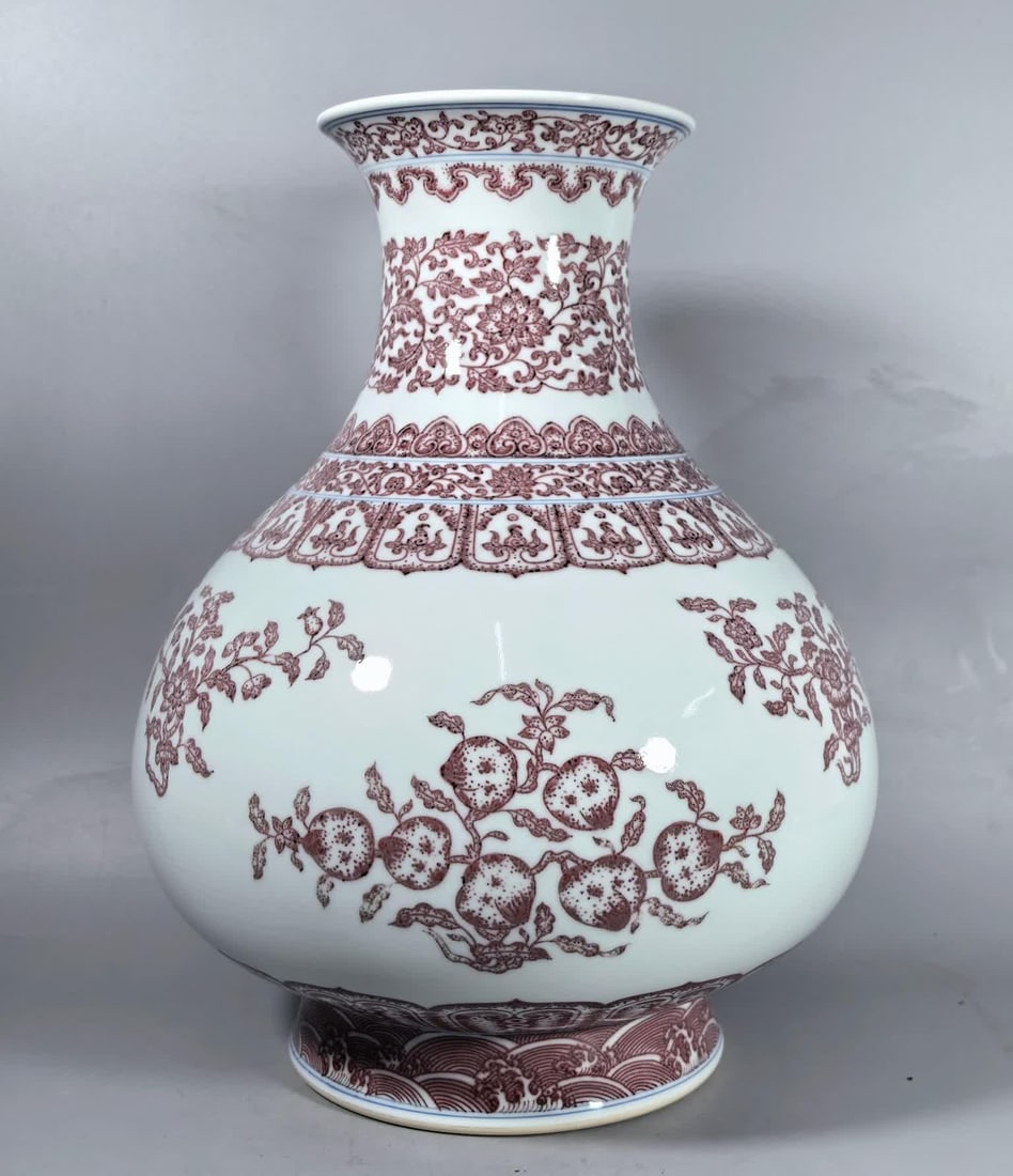 A Qing Yongzheng glazed red three-flower and three-fruit pattern bottle (1 of 9)