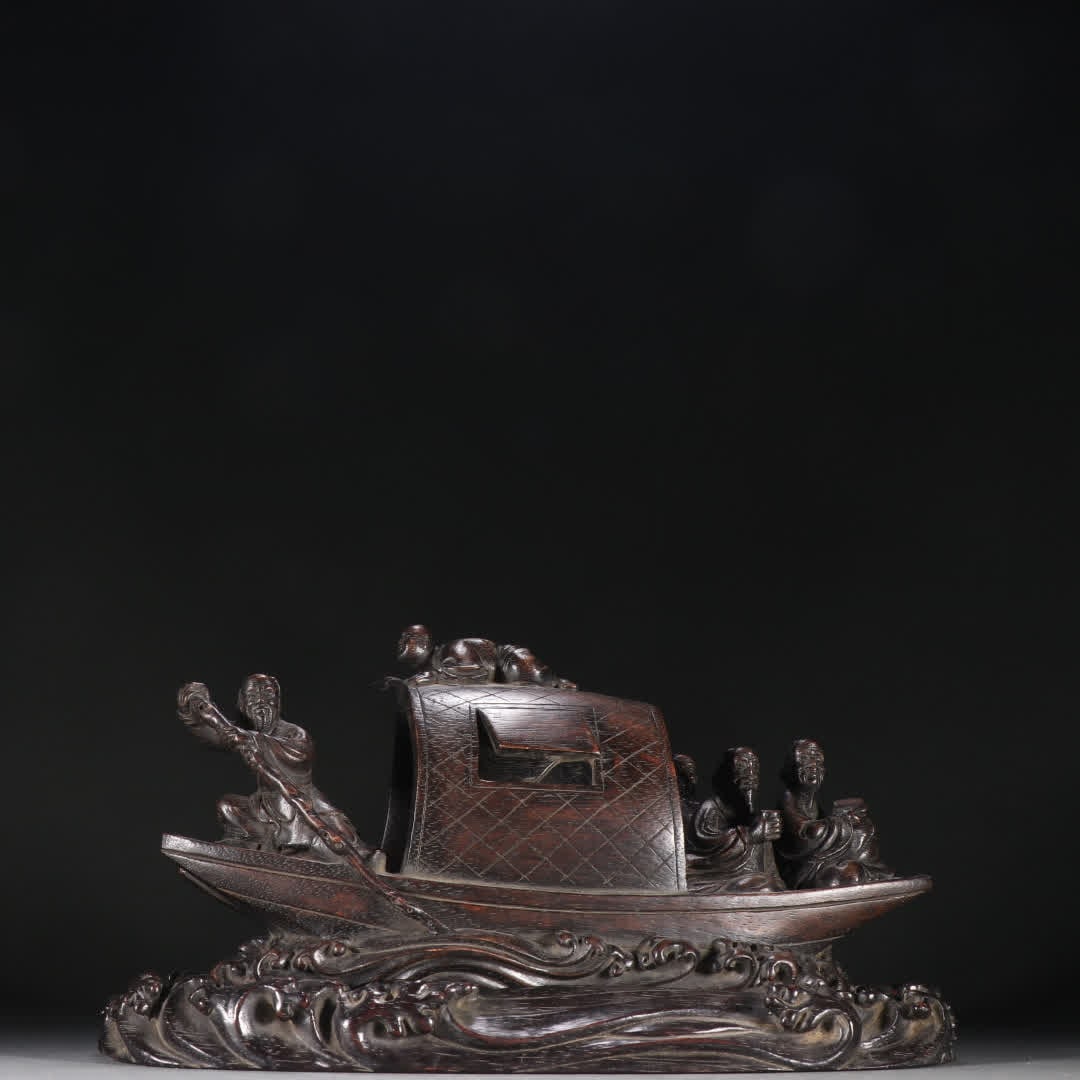 An agarwood figure boating ornament (1 of 9)