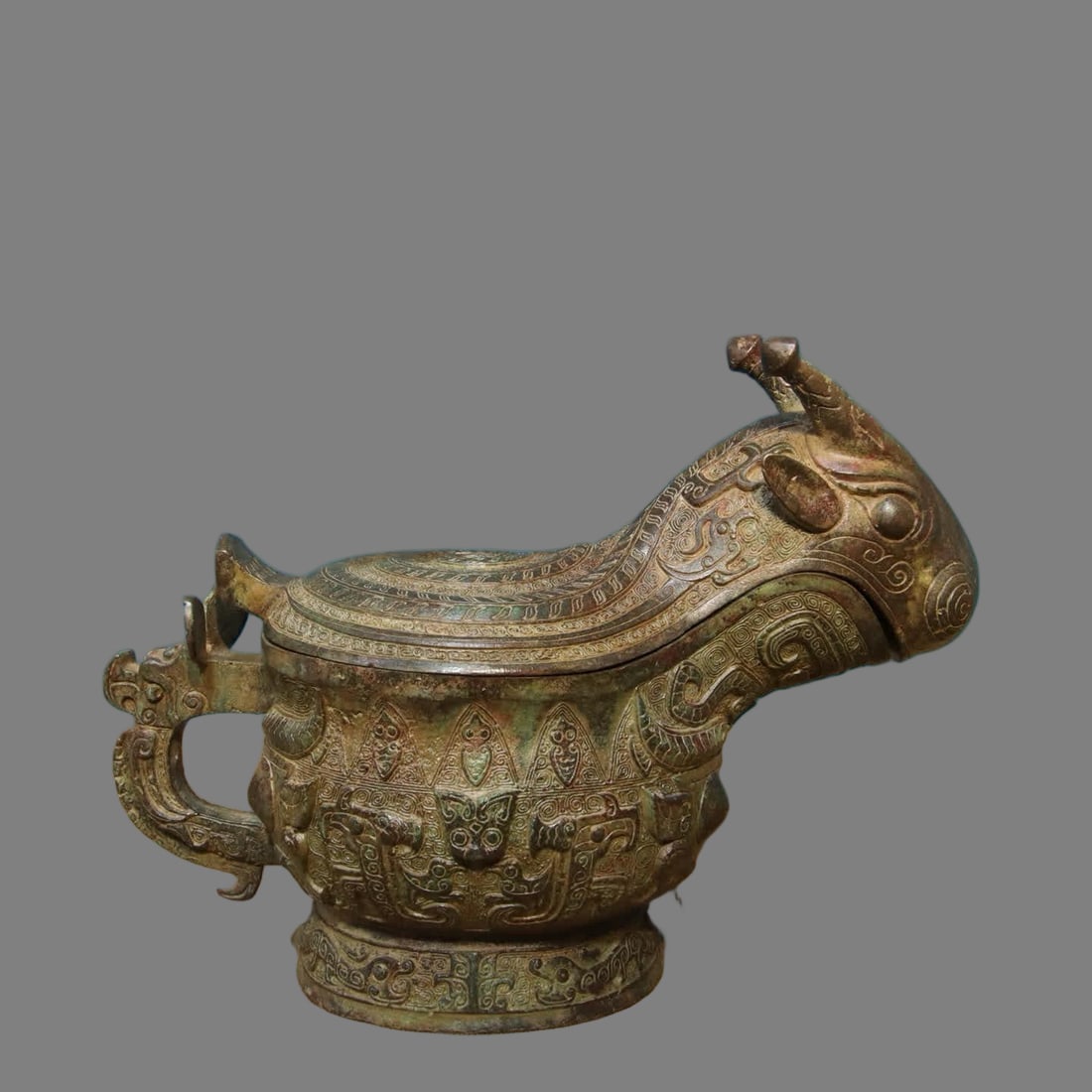 A piece of bronze-coiled dragon cup (1 of 9)