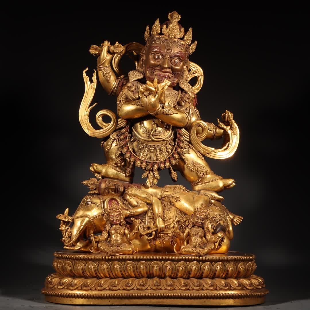 A Tibetan bronze gilt four-armed Mahakala statue (1 of 15)