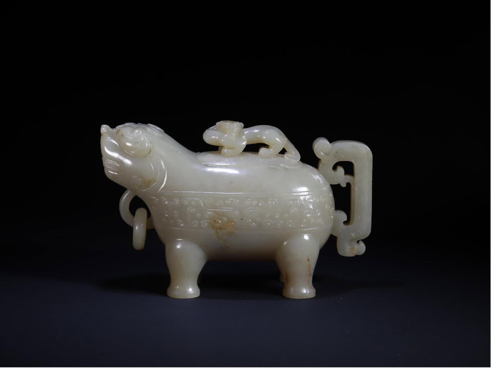 A Qing Dynasty beast holding a living ring dragon bottle (1 of 9)