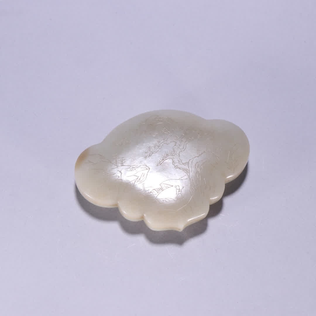 A Qing Dynasty Hetian jade landscape figure cover box (1 of 9)