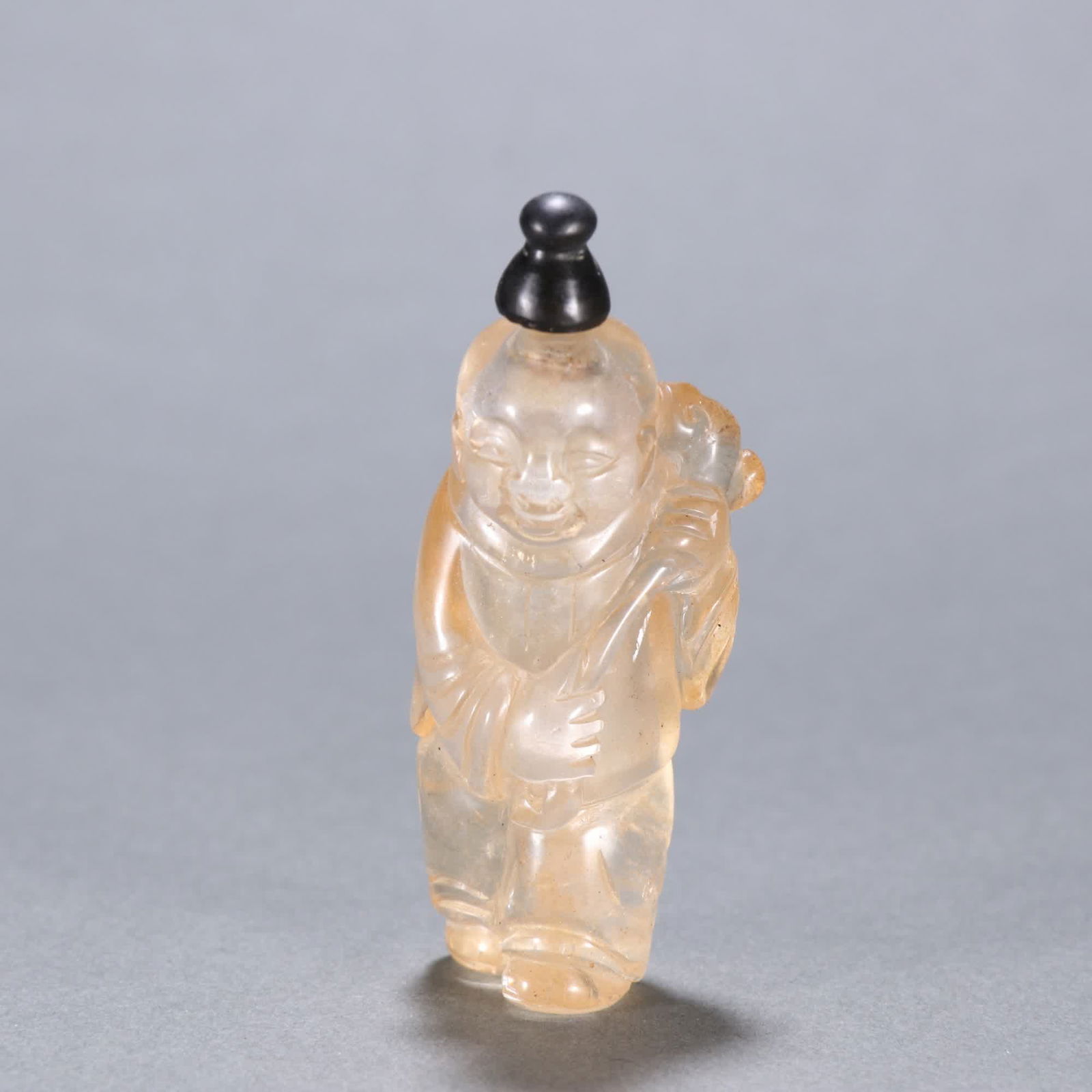 A Qing Dynasty natural crystal figure snuff bottle (1 of 9)