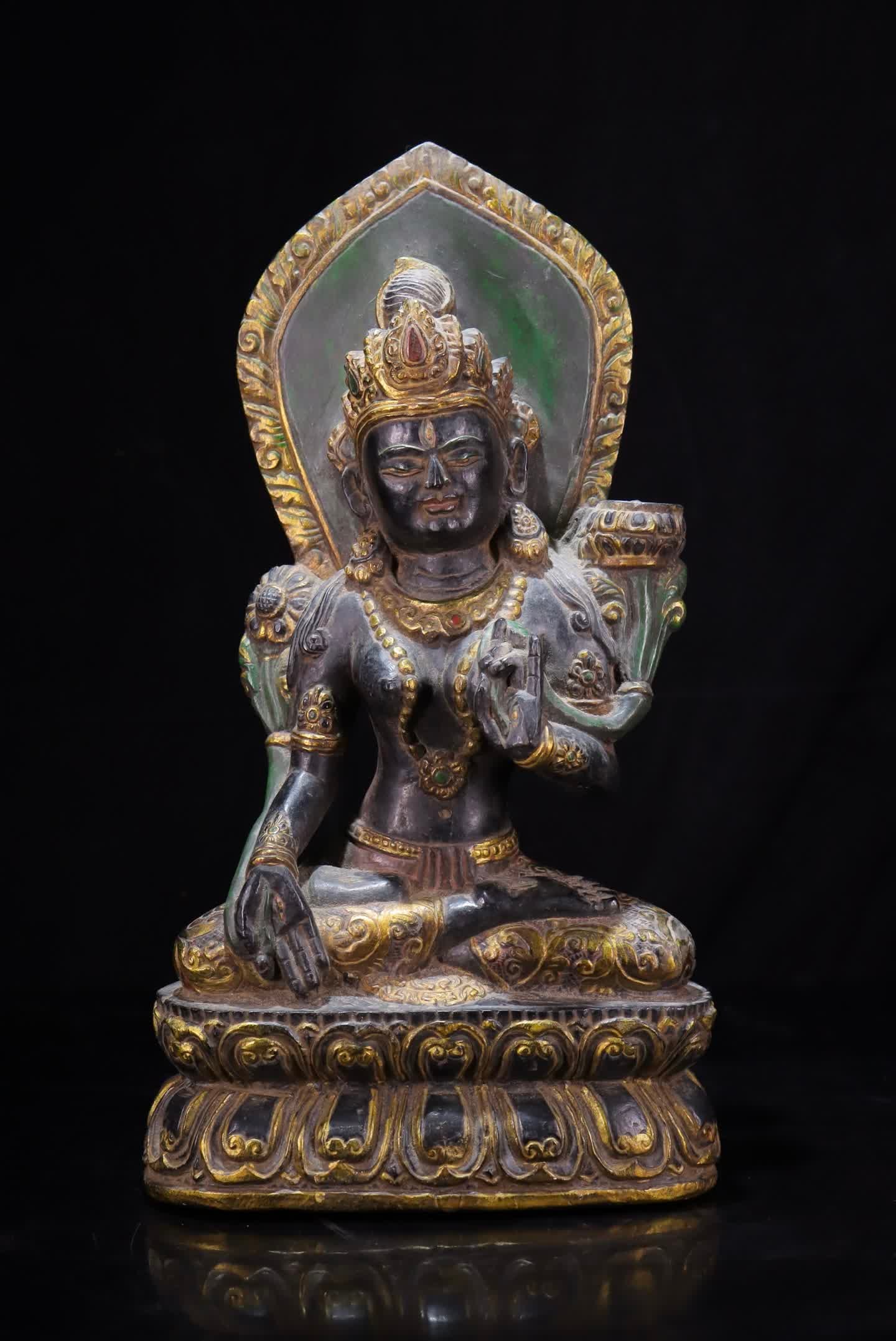 A black stone gold-painted green Tara statue (1 of 12)