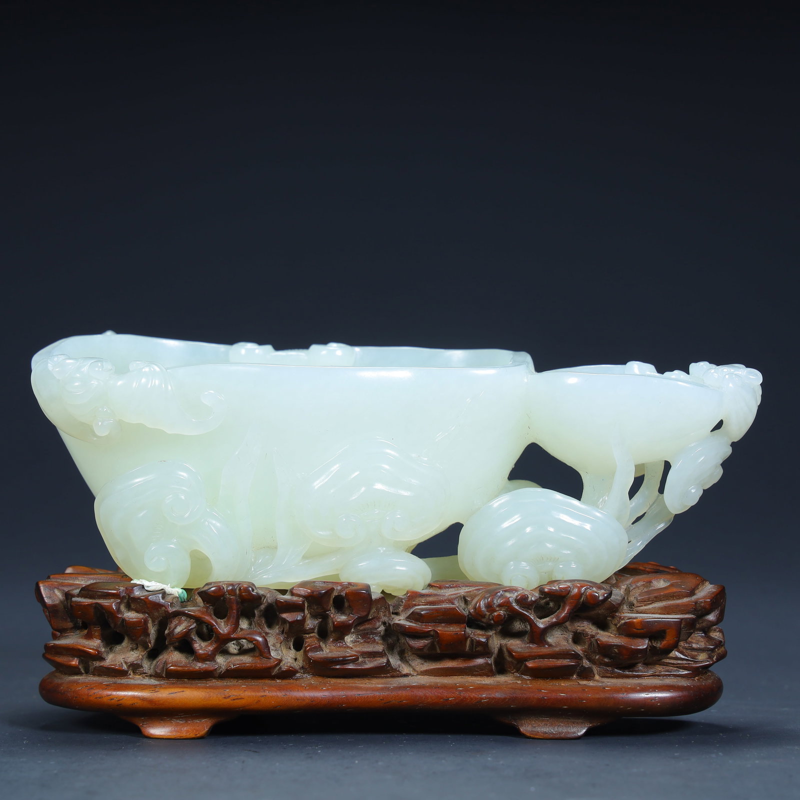 A Qing Dynasty Hetian jade "Fushou" theme washed ornament (1 of 13)