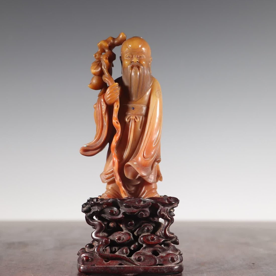 A Qing Dynasty Shoushan stone shouxing statue (1 of 9)