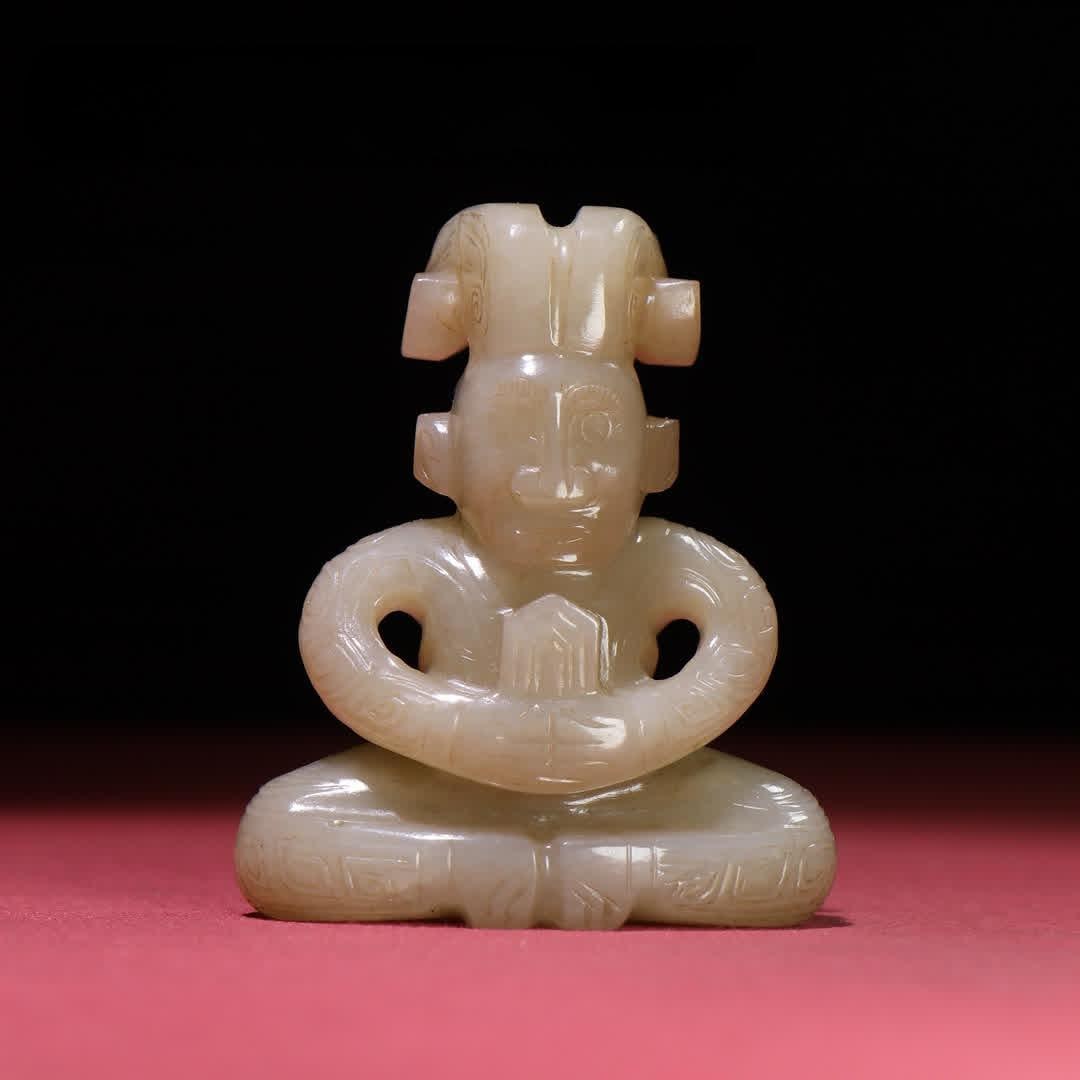 A Han Dynasty white jade seed material god man round carving handle (1 of 9)