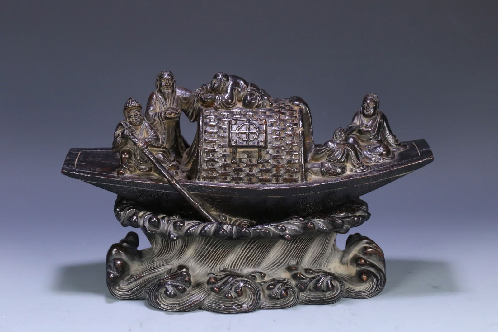 A Qing Dynasty rosewood sea bottom support agarwood figure boating ornament (1 of 9)
