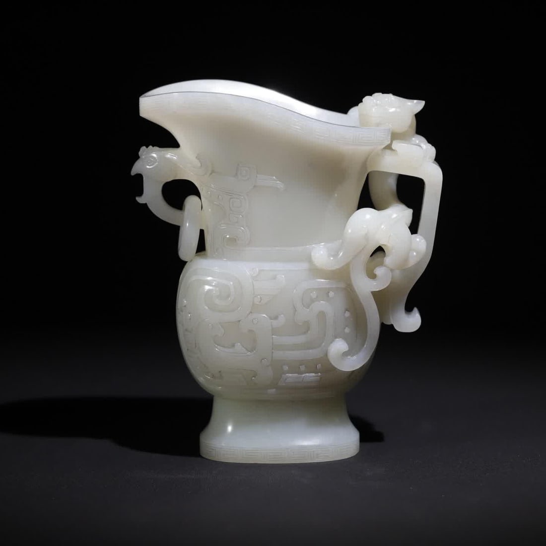 A Qing Dynasty dragon white jade cup (1 of 9)