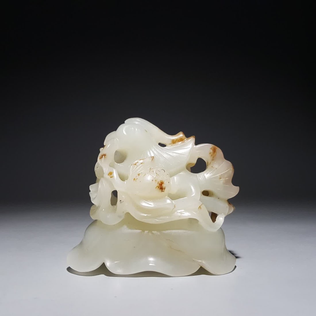 A piece of Qing Dynasty Hetian jade mandarin duck water play stove top: Qing Dynasty Hetian jade mandarin duck playing water stove top SIZE: 5.7x6x3.9cm W:110g (The Dimensions Of All Batches Are Manually Measured.If You Need More Detailed Information, Please Contact Our C