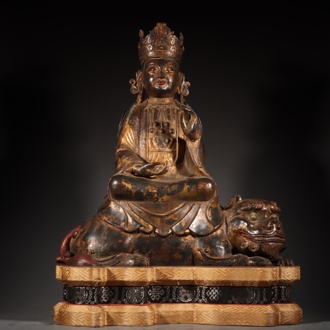 A Tibetan statue of Manjushri Bodhisattva in copper clay gold (1 of 13)