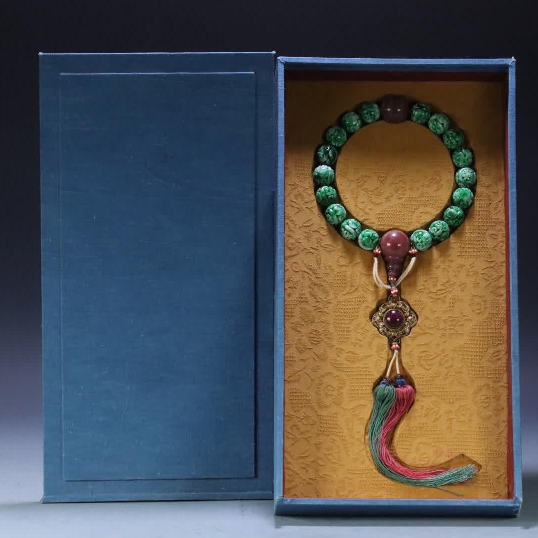 A piece of Qing Dynasty large-size ruby jade group longevity pattern eighteen sons handheld (1 of 9)