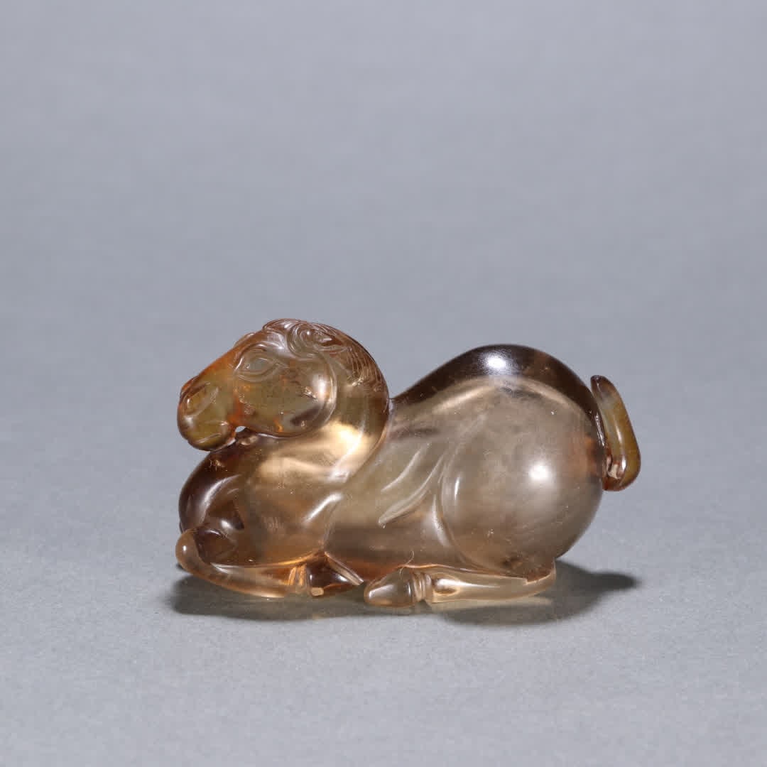 A piece of tea quartz sleeping horse snuff bottle (1 of 9)